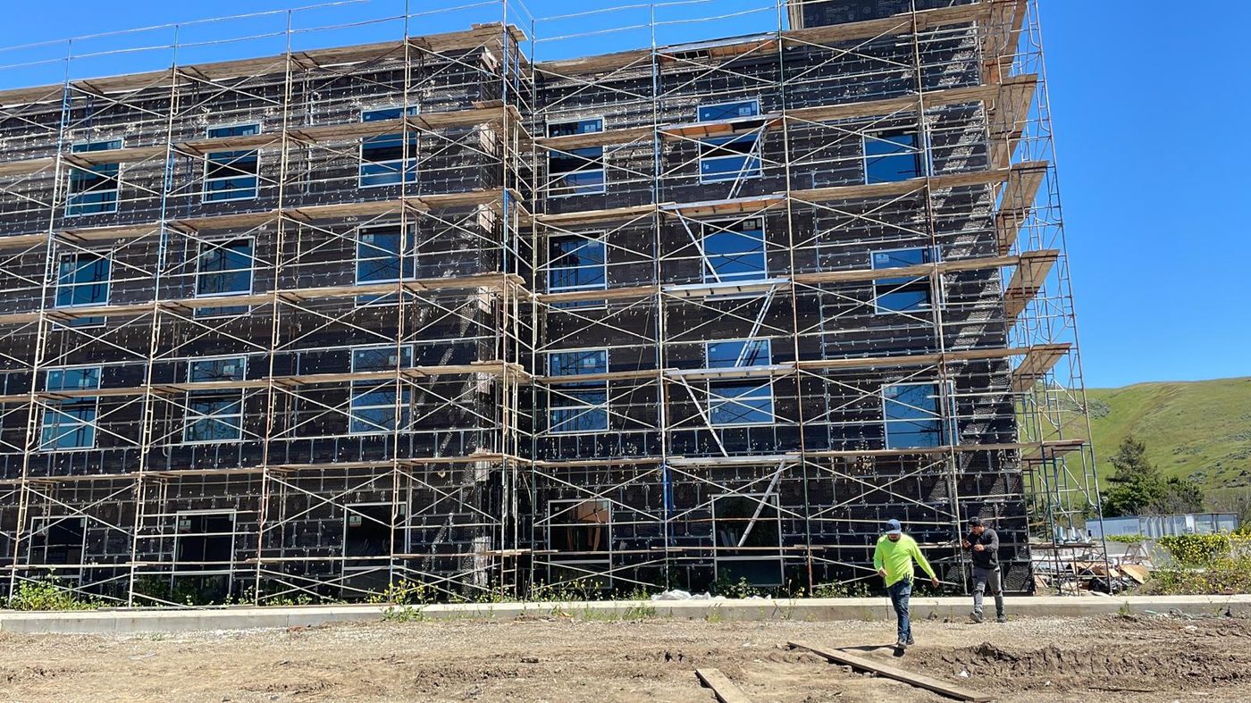 Multifamily building — lath stage with Central Coast hills